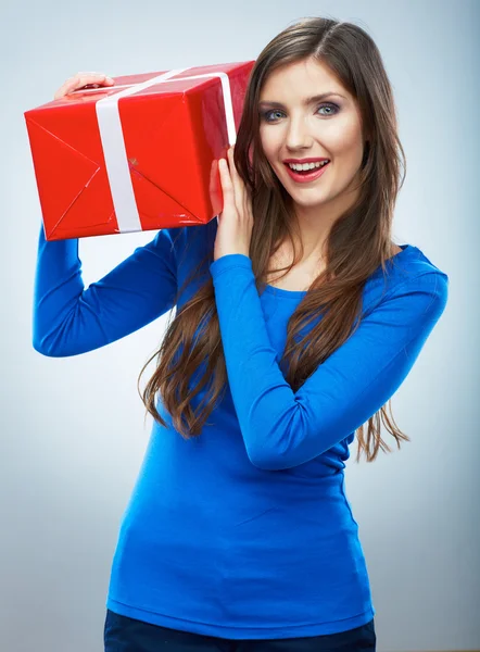 Young happy smiling woman hold red gift box — Stock Photo, Image