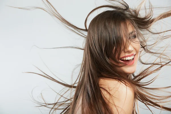 Femme visage avec mouvement de cheveux — Photo