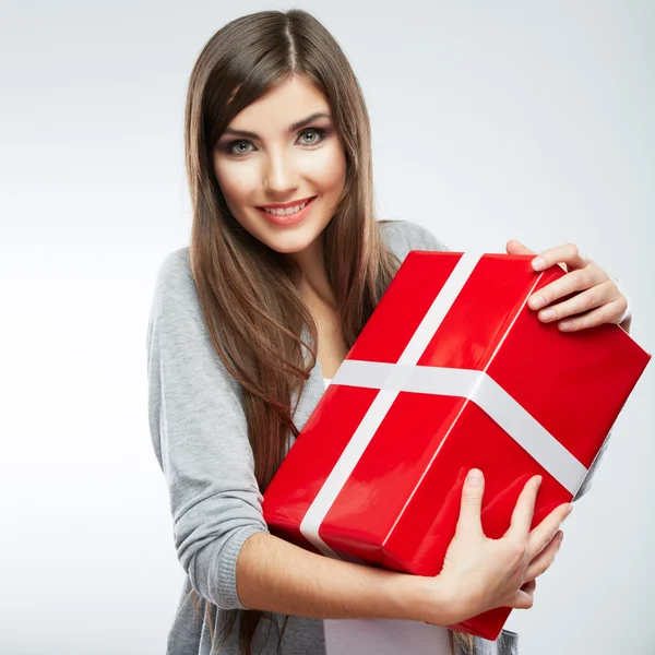 Young woman portrait hold gift in christmas color style — Stock Photo, Image