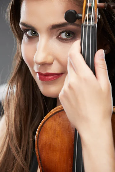 Music violin. Female face close up — Stock Photo, Image