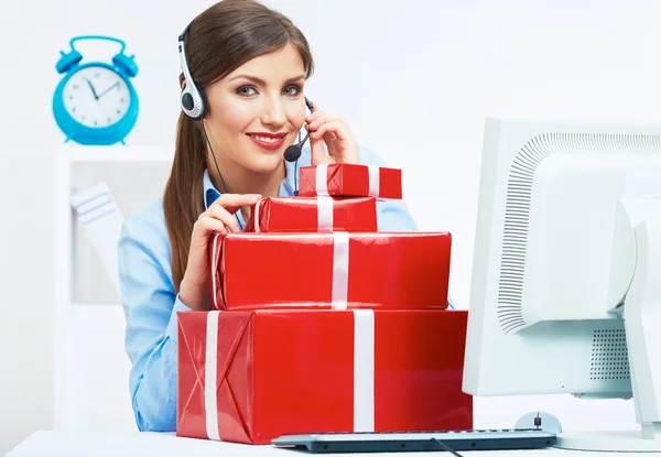 Business woman at work in office with red gift box — Stock Photo, Image