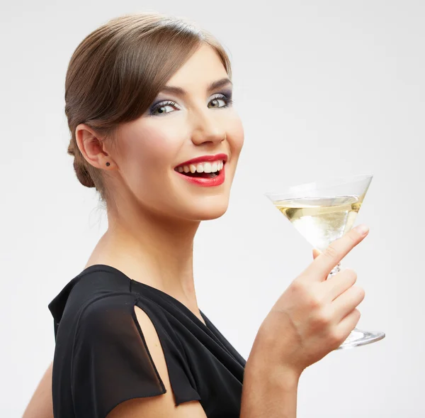 Young happy woman in black dress with glass. Royalty Free Stock Photos