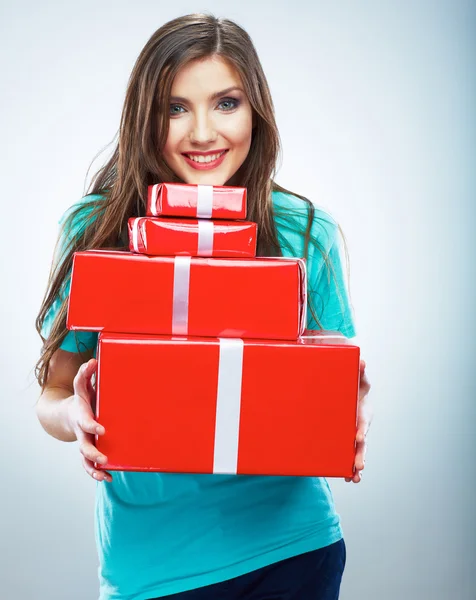 Portrait of young happy smiling woman hold red gift box. Isolat — Stock Photo, Image