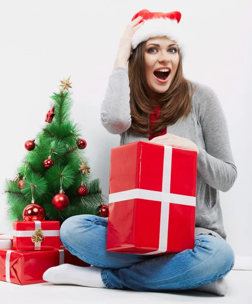 Glückliche Frau mit Weihnachtsmütze — Stockfoto