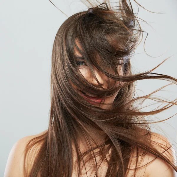 Žena s vlasy pohybu — Stock fotografie