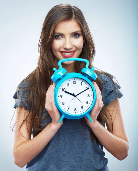 Woman holding clock — Stock Photo, Image