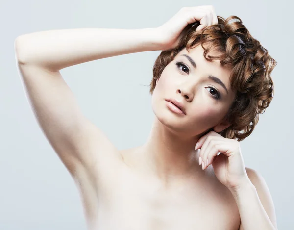 Portrait of woman with raised hands — Stock Photo, Image