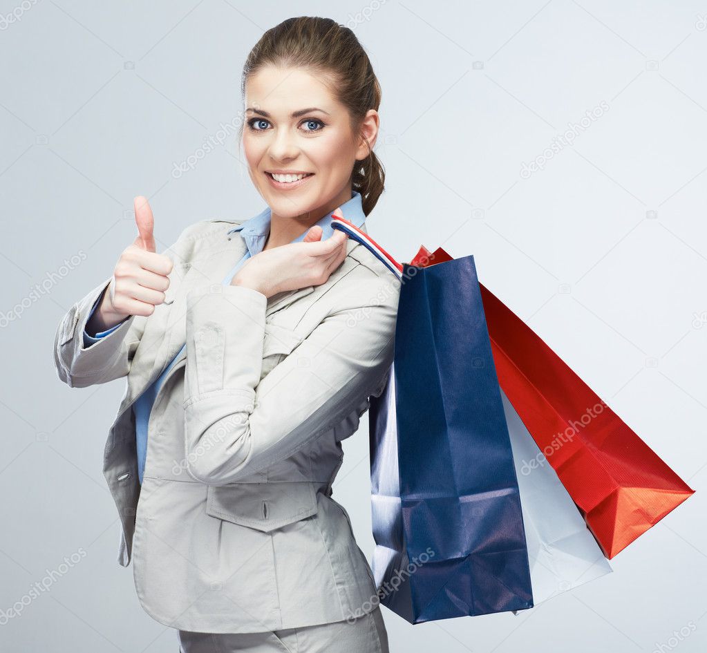 Business woman holding shopping bag