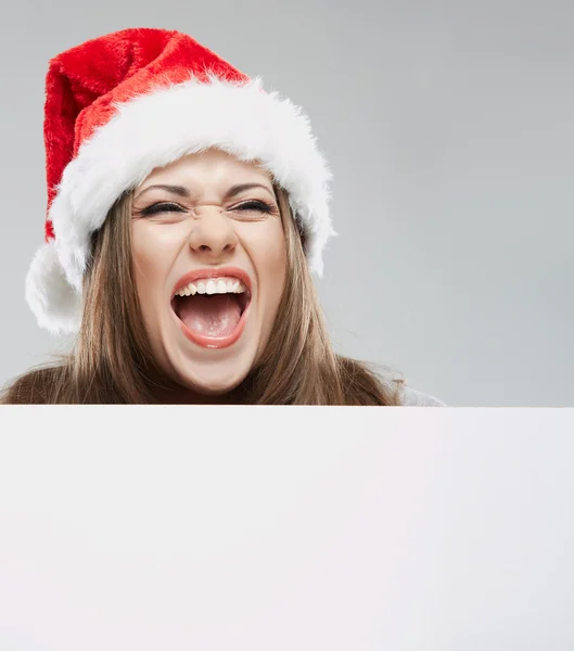 Frau mit Weihnachtsmütze und leerem Banner — Stockfoto