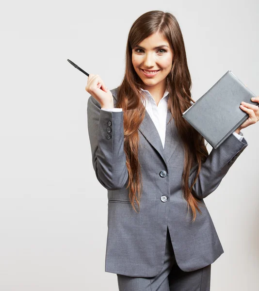 Business woman holding bok — Stockfoto