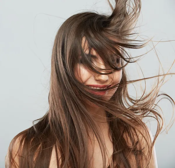 Frau mit Haarbewegungen — Stockfoto