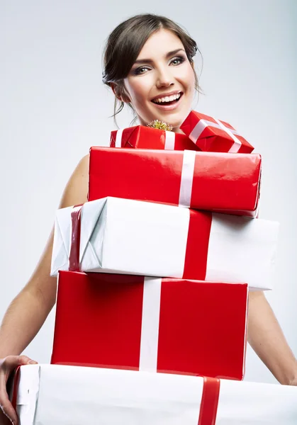 Woman holding gift boxes — Stock Photo, Image