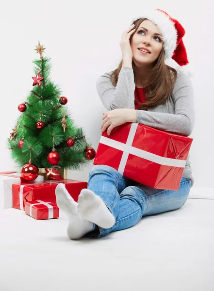 Gelukkige vrouw in Kerstman hoed — Stockfoto