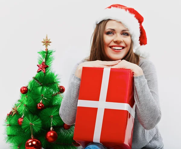 Gelukkige vrouw in Kerstman hoed — Stockfoto
