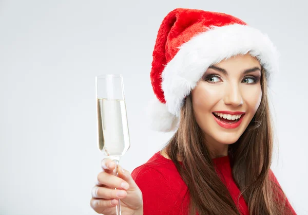 圣诞老人帽子控股杯香槟的女人 — 图库照片