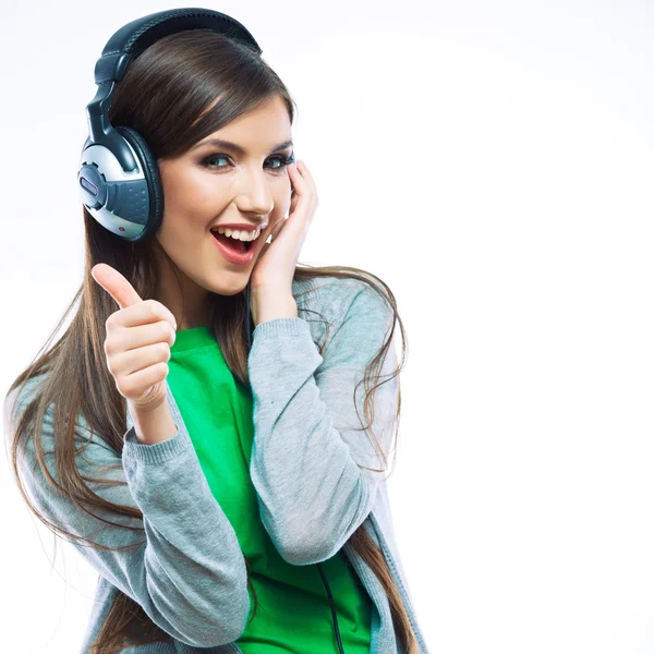 Young woman with headphones with thumb up Stock Picture