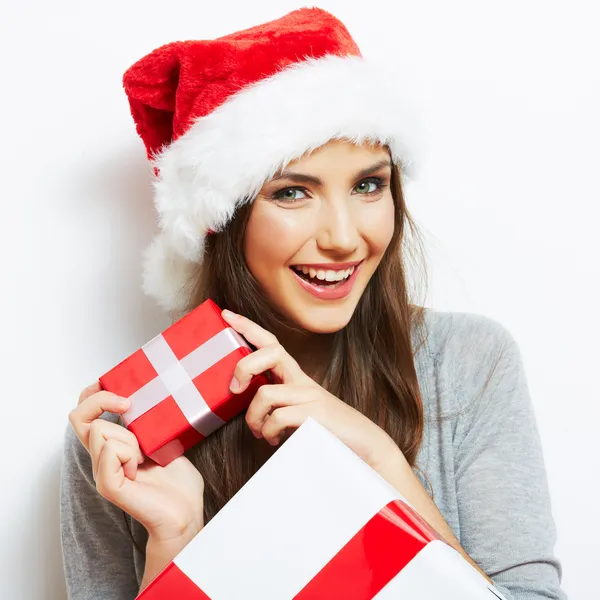Frau mit Weihnachtsmütze lizenzfreie Stockfotos