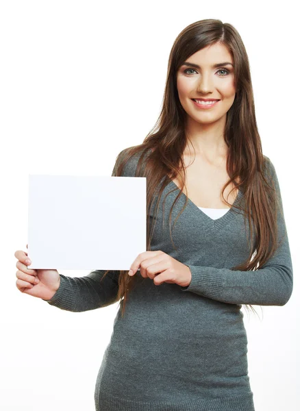 Mujer sosteniendo blanco papel en blanco Imagen de stock