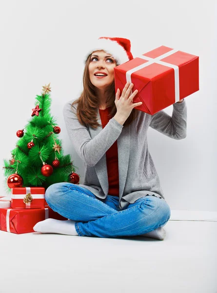 Frau mit Weihnachtsmütze — Stockfoto