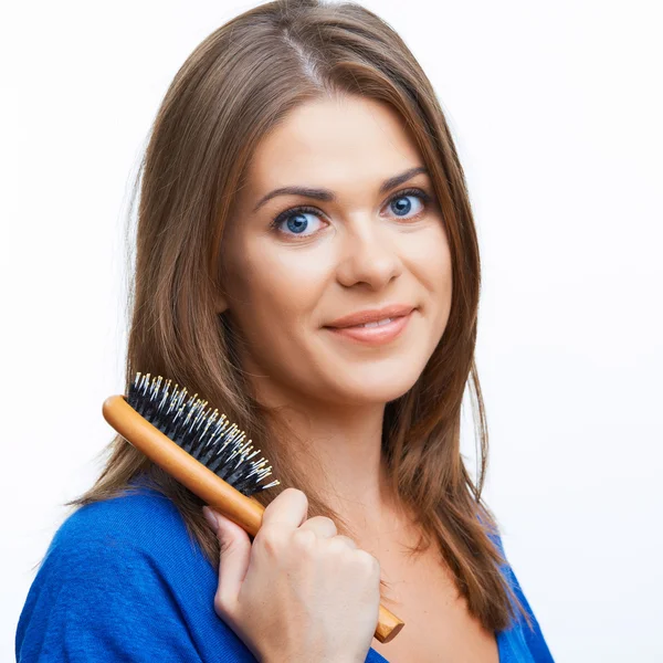 Woman comb long hair — Stock Photo, Image