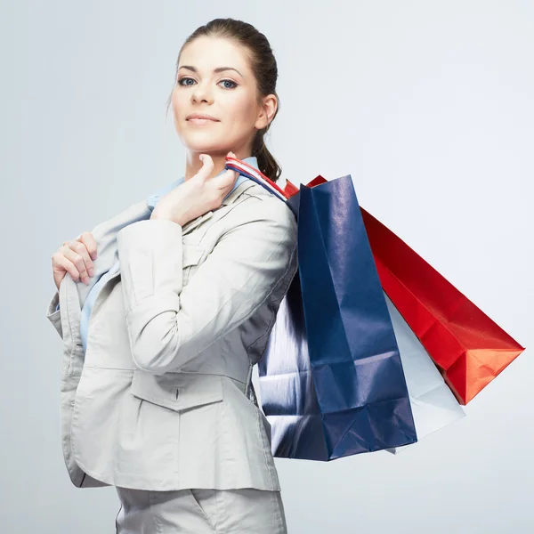 Vrouw wachtruimte shopping tassen — Stockfoto