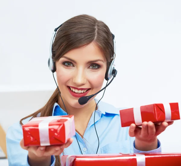 Smiling operator with gift box — Stock Photo, Image