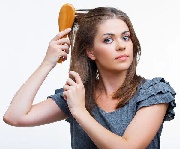 Woman comb hair — Stock Photo, Image