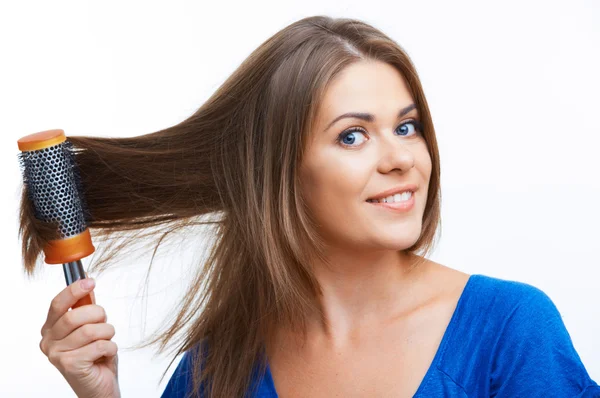 Woman comb long hair — Stock Photo, Image