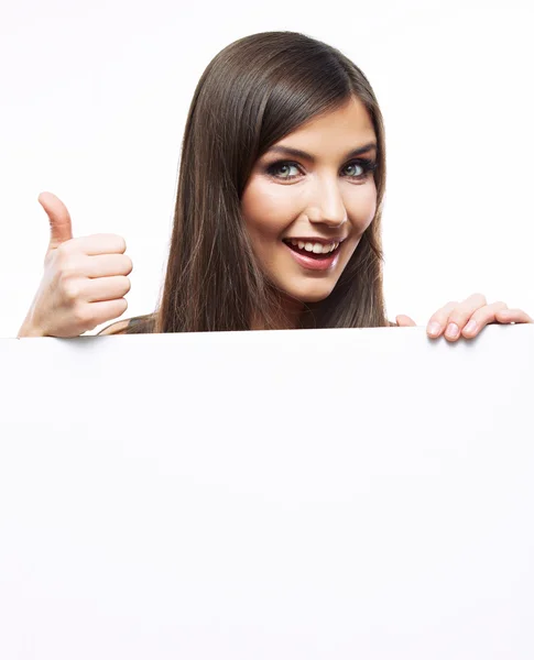 Smiling girl holding white blank card and showing thumb up . — Stock Photo, Image