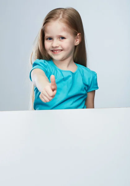 Dziecko dziewczynka z biały deska Wyświetlono kciuk w. — Zdjęcie stockowe