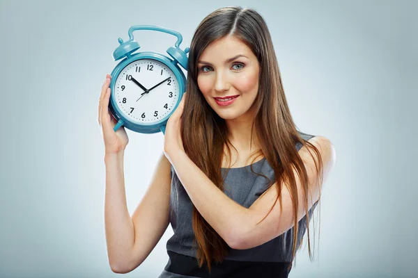 Mujer de negocios sosteniendo reloj . —  Fotos de Stock