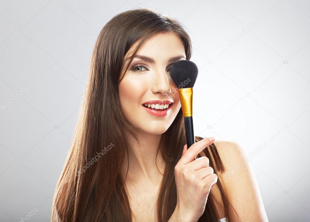 Woman hold make up brush