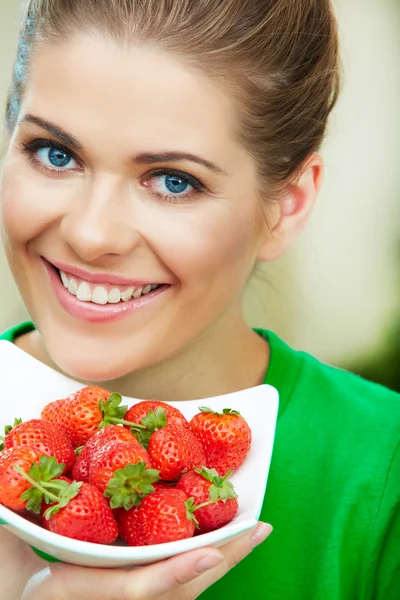 Woman sting strawberry — Stock Photo, Image