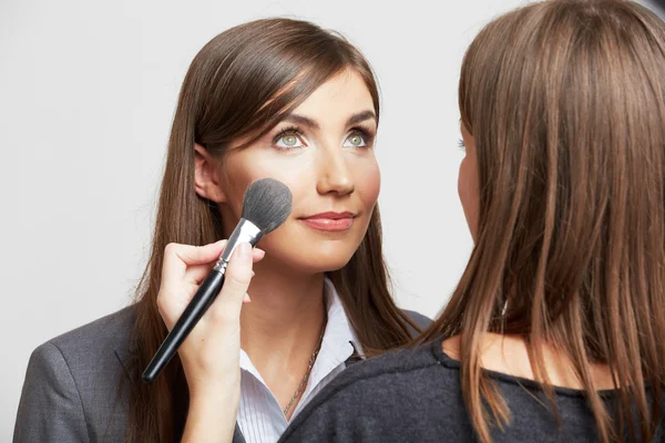 Business woman uses service of make up — Stock Photo, Image