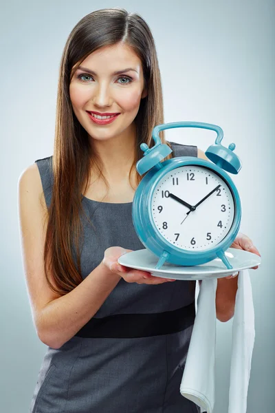 Business woman holding watch — Stock Photo, Image