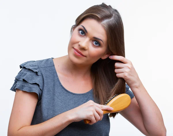 Woman comb hair — Stock Photo, Image