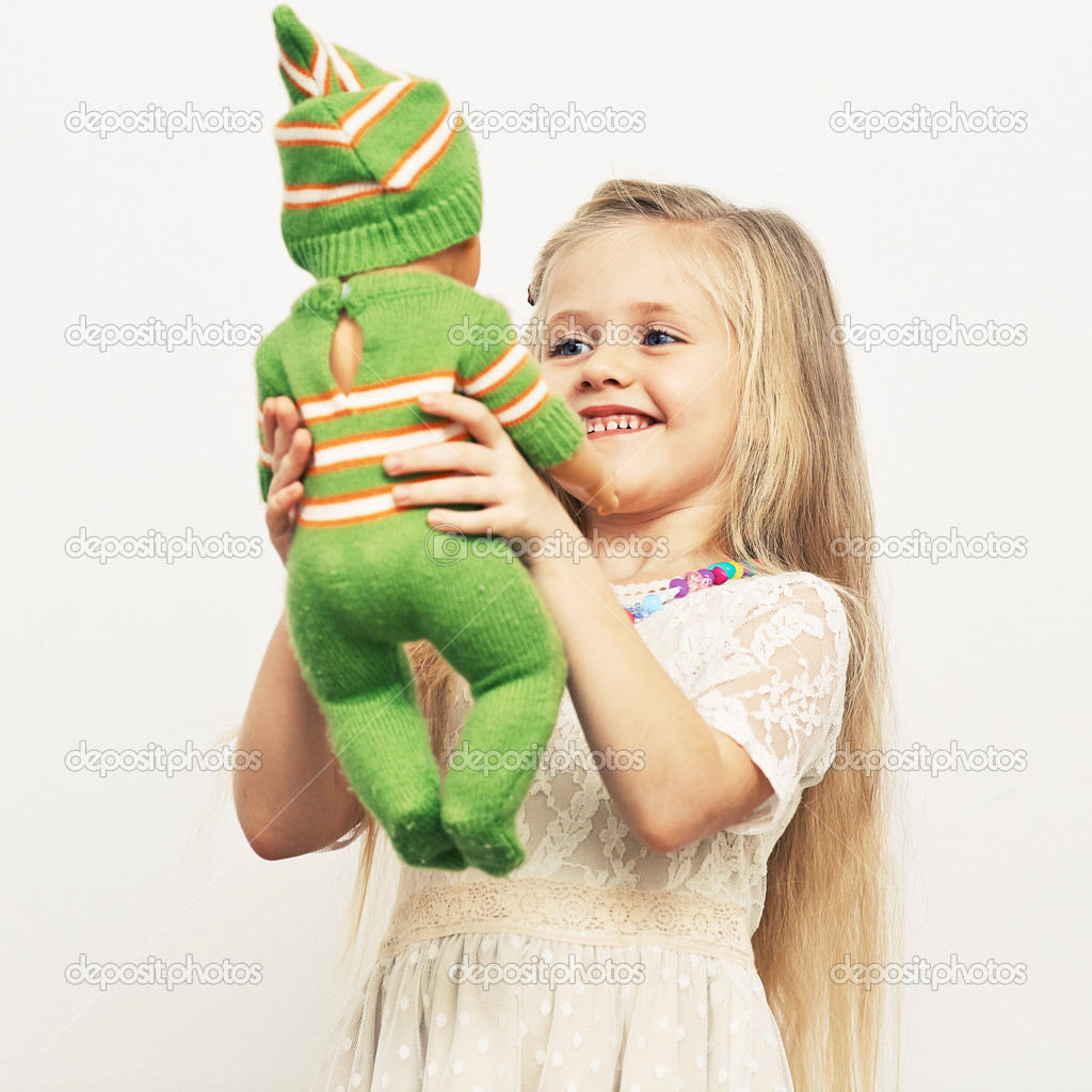 Girl play with doll