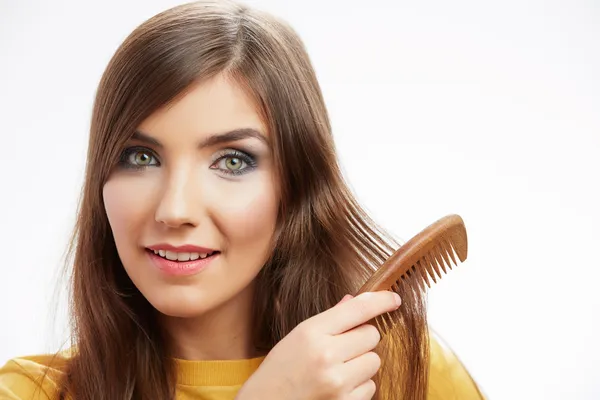 Woman comb hair — Stock Photo, Image