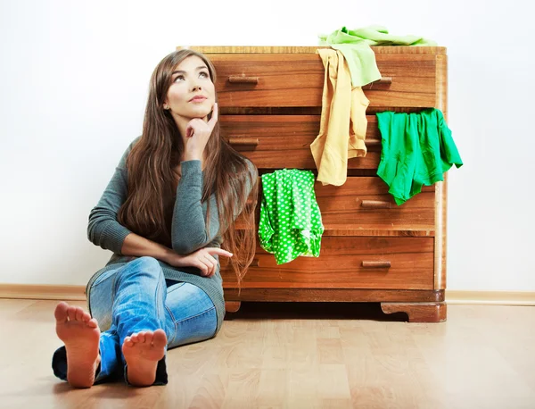 Woman and cupboard — Stock Photo, Image