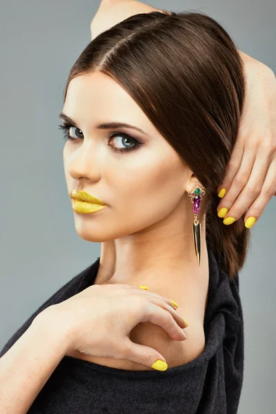 Woman with yellow lips and nails. — Stock Photo, Image