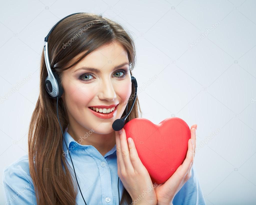 Woman call center operator hold heart