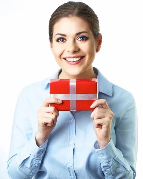 Business woman holds gift — Stock Photo, Image