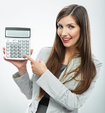 Woman holds calculator