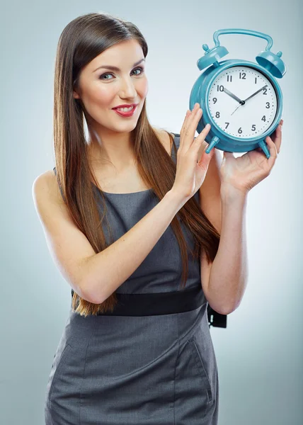 Business woman holding watch — Stock Photo, Image