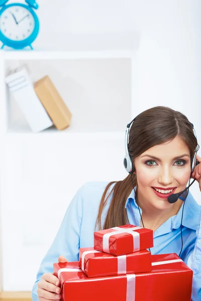 Smiling operator with gift — Stock Photo, Image