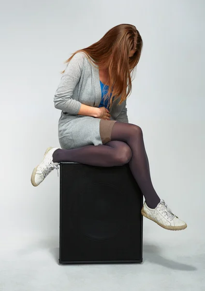 Woman on amplifier — Stock Photo, Image