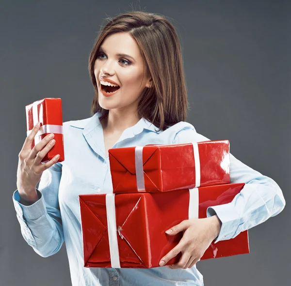 Woman holds gift boxes — Stock Photo, Image