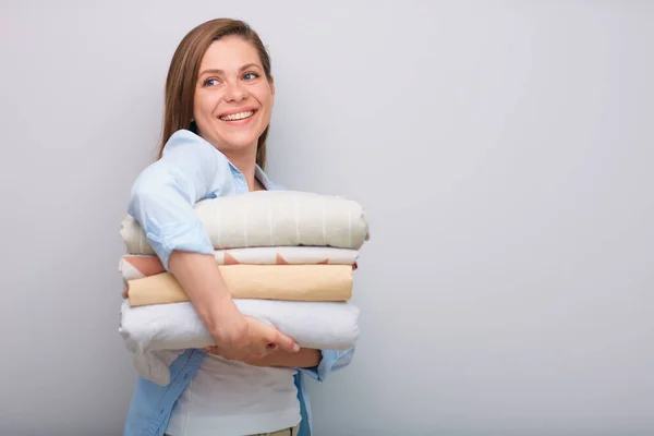 Smiling Woman Holding Clothes Bed Sheets Looking Away Shoulder Isolated — Stock Photo, Image