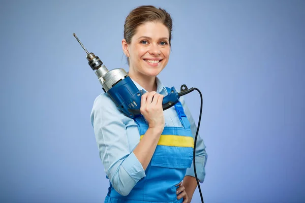 Woman Holding Drill Shoulder Drill Blue Overalls Isolated Female Portrait — Stock Photo, Image