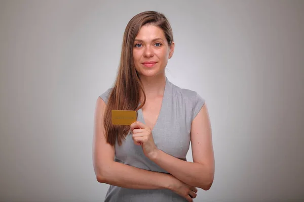 Isolated business woman portrait with gold credit card, smiling business person